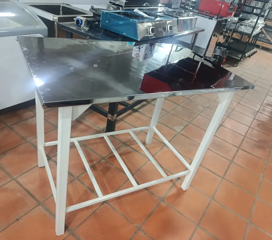 [1181] MESA INOXMAQ 115X70 C/MADERA Y REJILLA